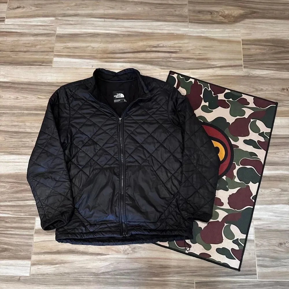 The North Face black quilted diamond pattern puffer jacket